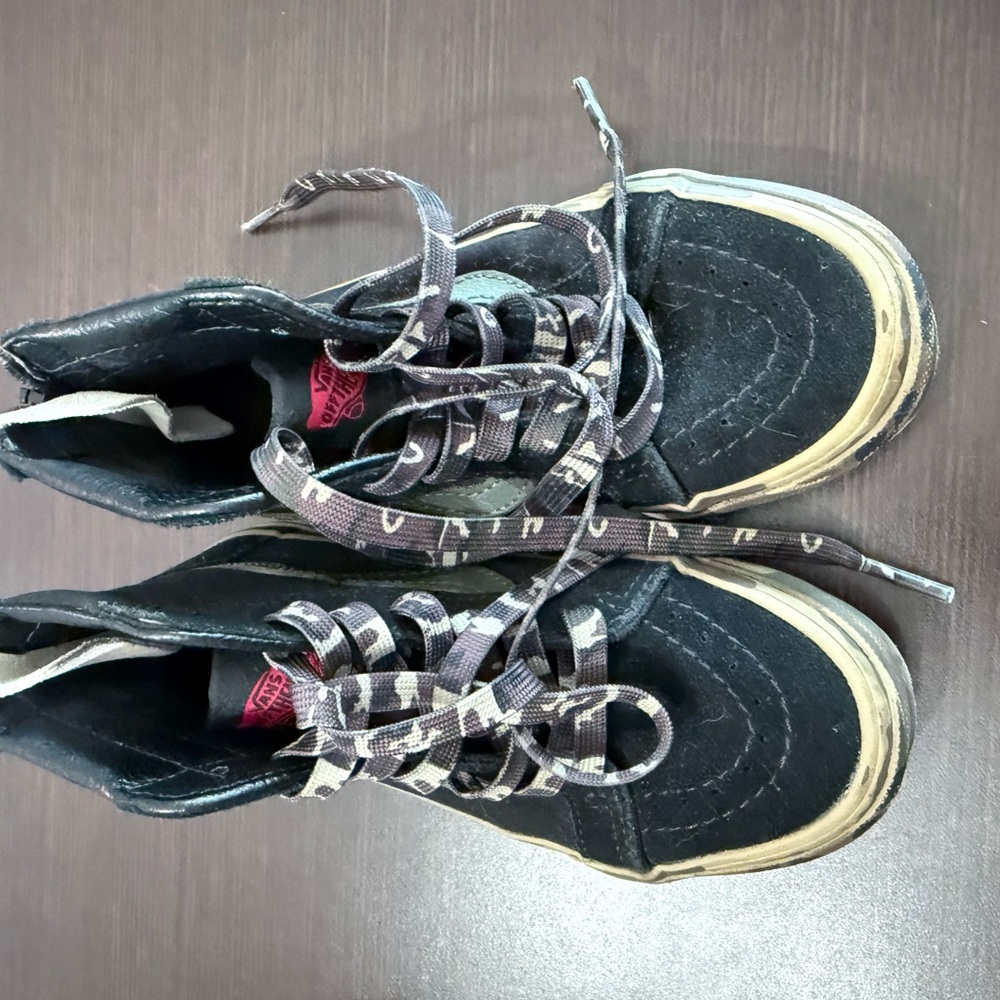 Vans Black and Tan Sneakers Sleek Camo Design